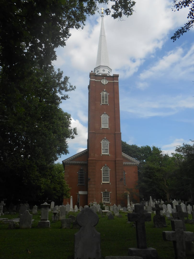 The 1761 brick St. Peter's Episcopal Church and surrounding churchyard in Philadelphia, Pennsylvania