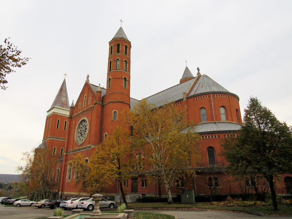 Saint Vincent Basilica seen from across the parking lot in autumn, Latrobe, Pennsylvania.