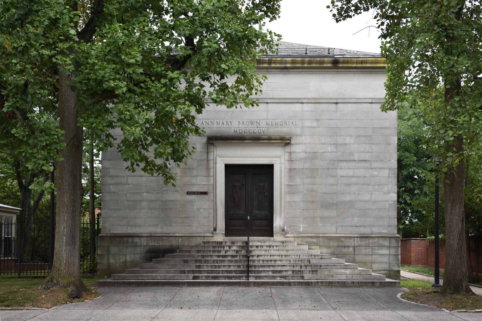 Windowless brick facade of the Annmary Brown Memorial at 21 Brown Street on the Brown University campus, Providence, Rhode Island