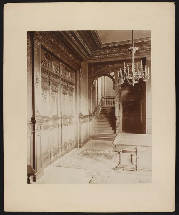 The carved-oak staircase hall of Belcourt, photographed by Frank H. Child shortly after the house was completed, 1895.