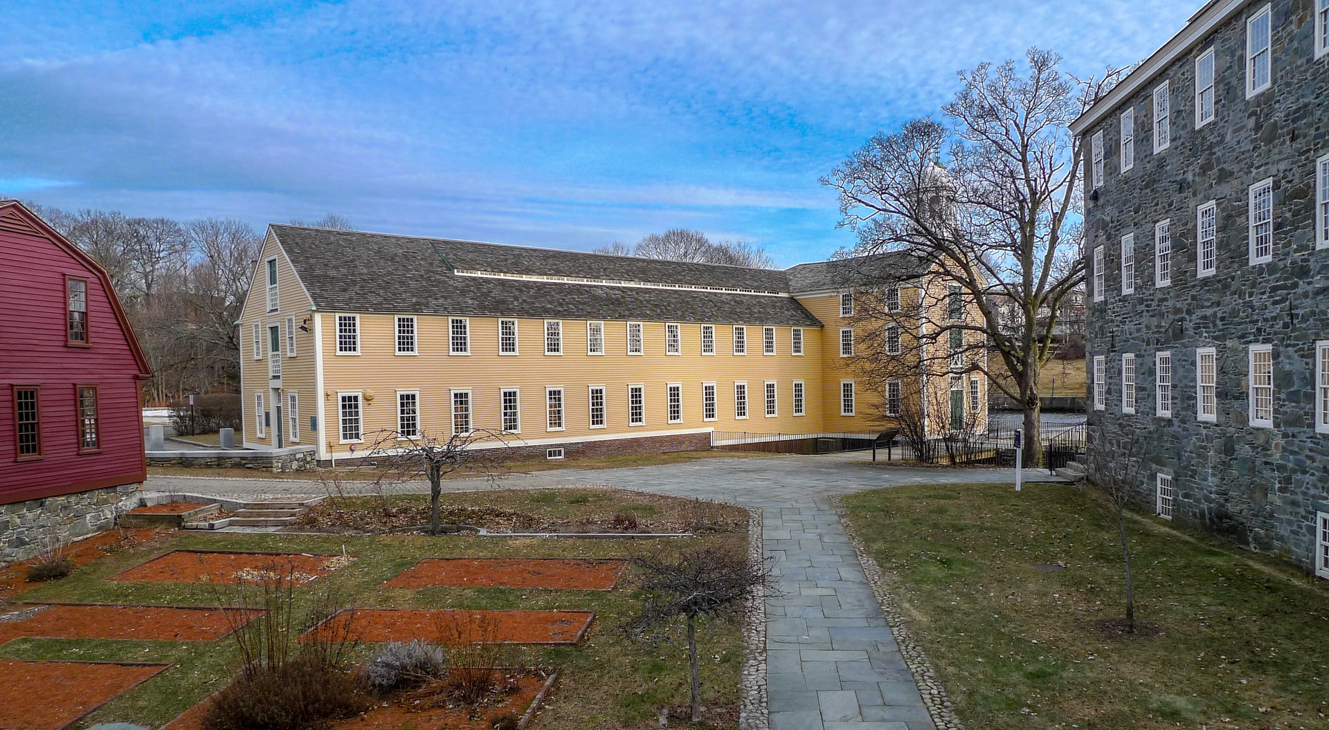 The historic Slater Mill building on the Blackstone River in Pawtucket, Rhode Island