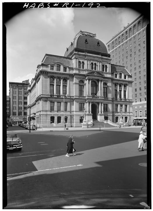 A street-level view of Providence City Hall's east and south elevations, photographed in May 1958 for the Historic American Buildings Survey (HABS RI,4-PROV,92-1).