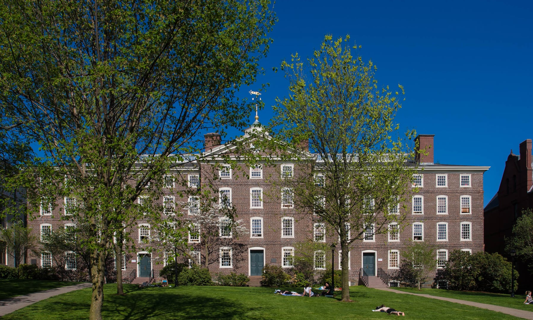 Georgian colonial brick facade of University Hall at Brown University, completed 1770, viewed from the College Green, Providence, Rhode Island