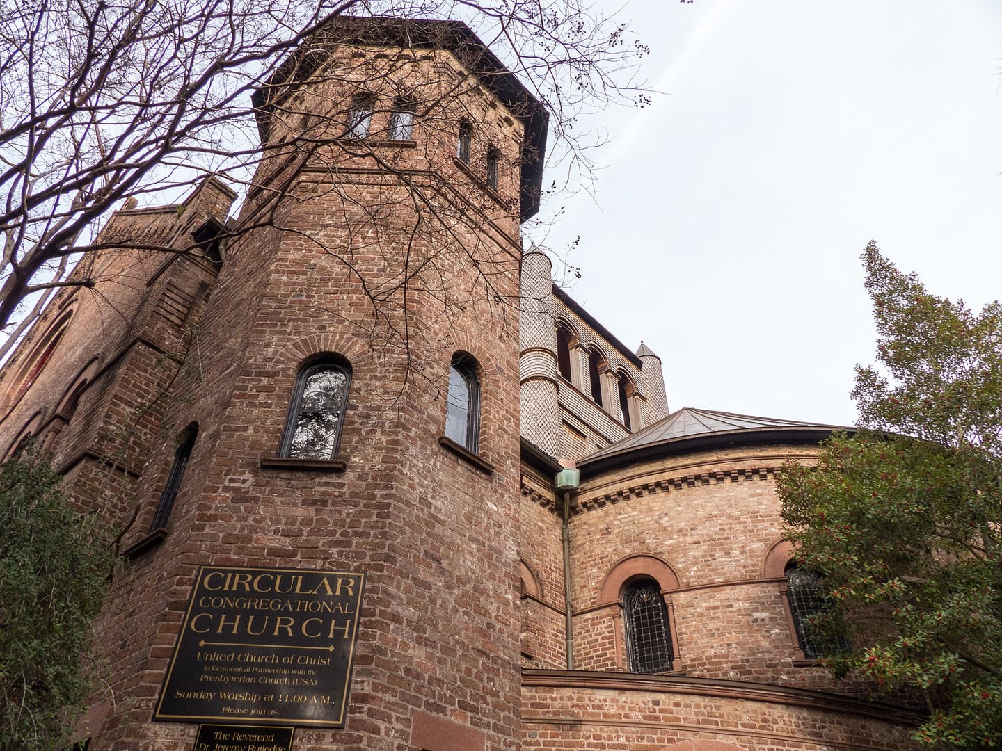 The Romanesque Revival Circular Congregational Church (1890-1892) with its adjoining 17th-century graveyard on Meeting Street in downtown Charleston, SC