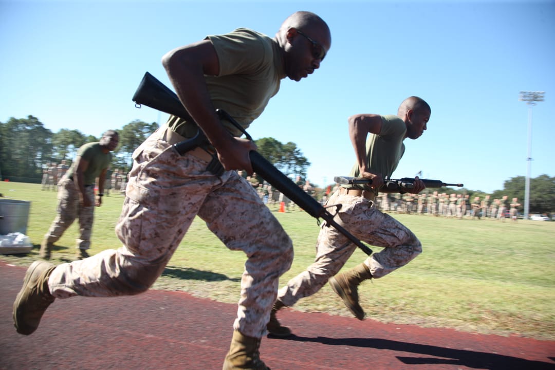 U.S. Marines from Headquarters and Service Battalion participate in a relay race Oct. 29, 2010, during the annual field meet held at Marine Corps Recruit Depot, Parris Island, S.C. (DoD photo by Lance Cpl. Rodion Zabolotniy, U.S. Marine Corps/Released) 101029-M-1365Z-038