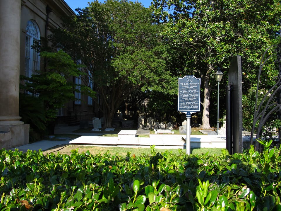 A grave plot and state historical marker beside St. Philip's Episcopal Church's Greek Revival portico, Charleston, South Carolina, 2011.