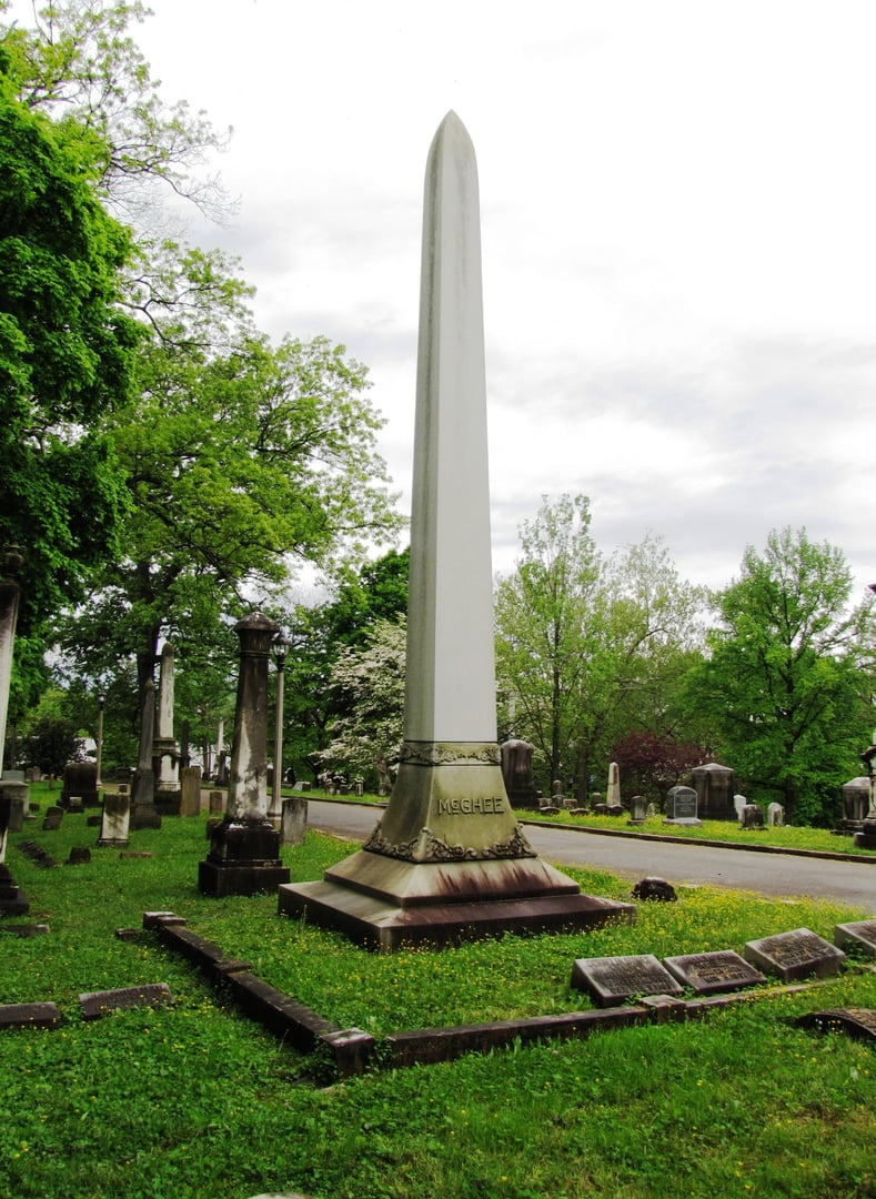 Tall stone obelisk among Victorian-era monuments at Old Gray Cemetery in Knoxville, Tennessee