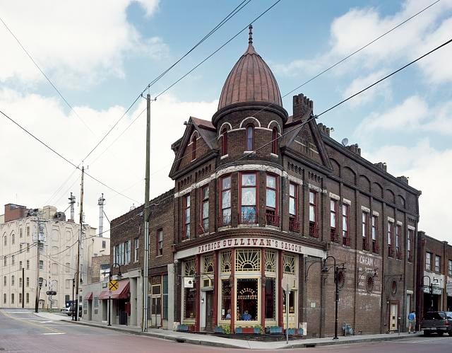 Restored brick corner facade of Patrick Sullivan's Saloon (1888) in Knoxville's Old City district at 100 Central Street.