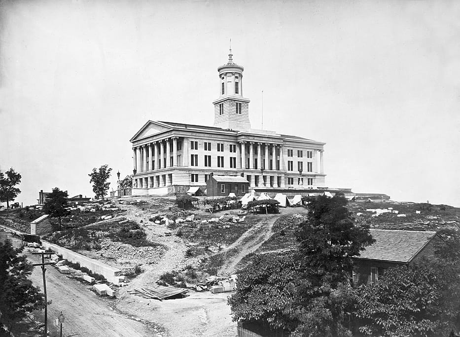 An albumen-print view of the Tennessee State Capitol circa 1865, by photographer George N. Barnard, from the George Eastman House collection.