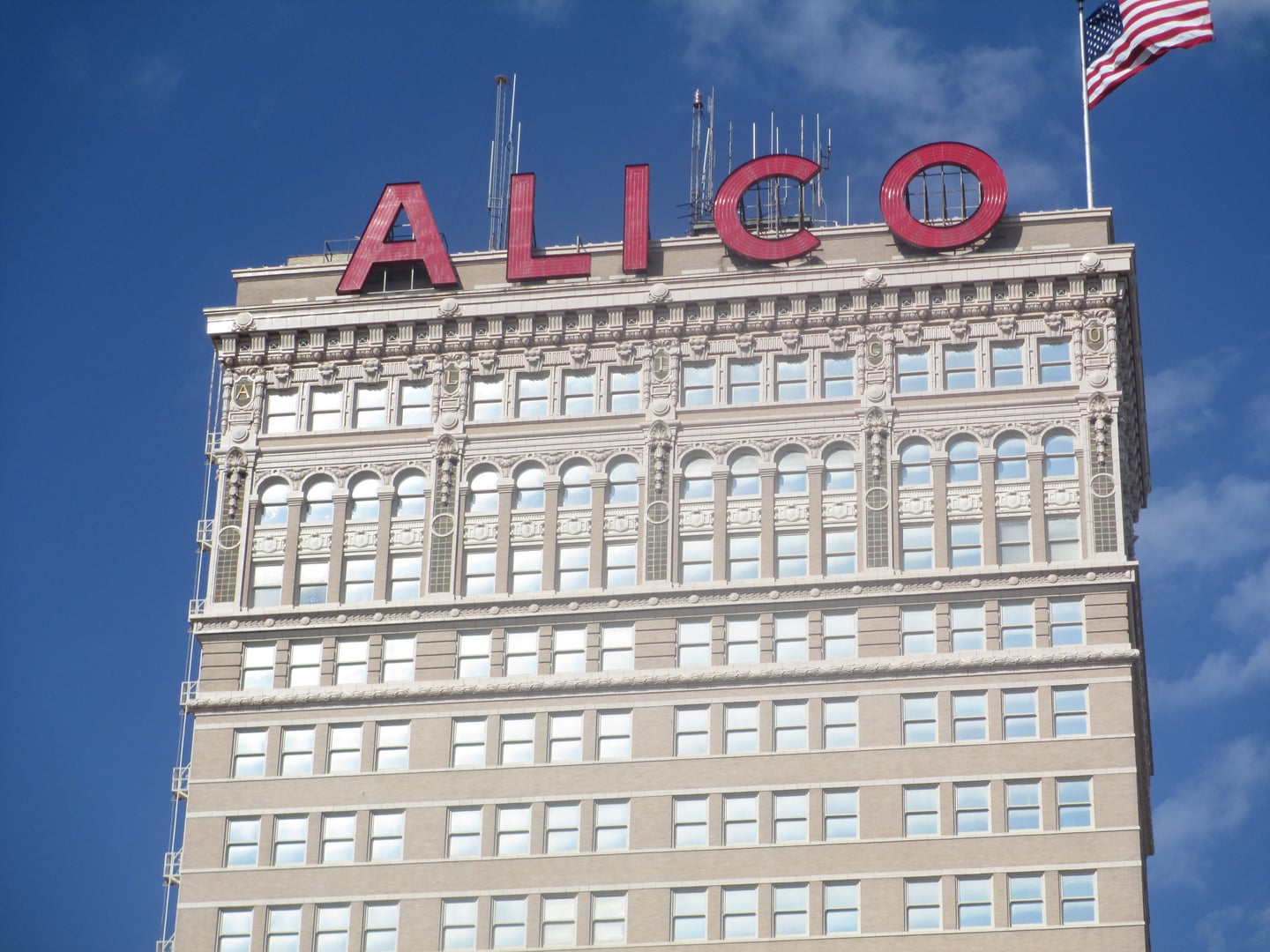 The 22-story ALICO Building on Austin Avenue in downtown Waco, Texas, photographed in 2013 showing the Beaux Arts tower and street-level commercial facade