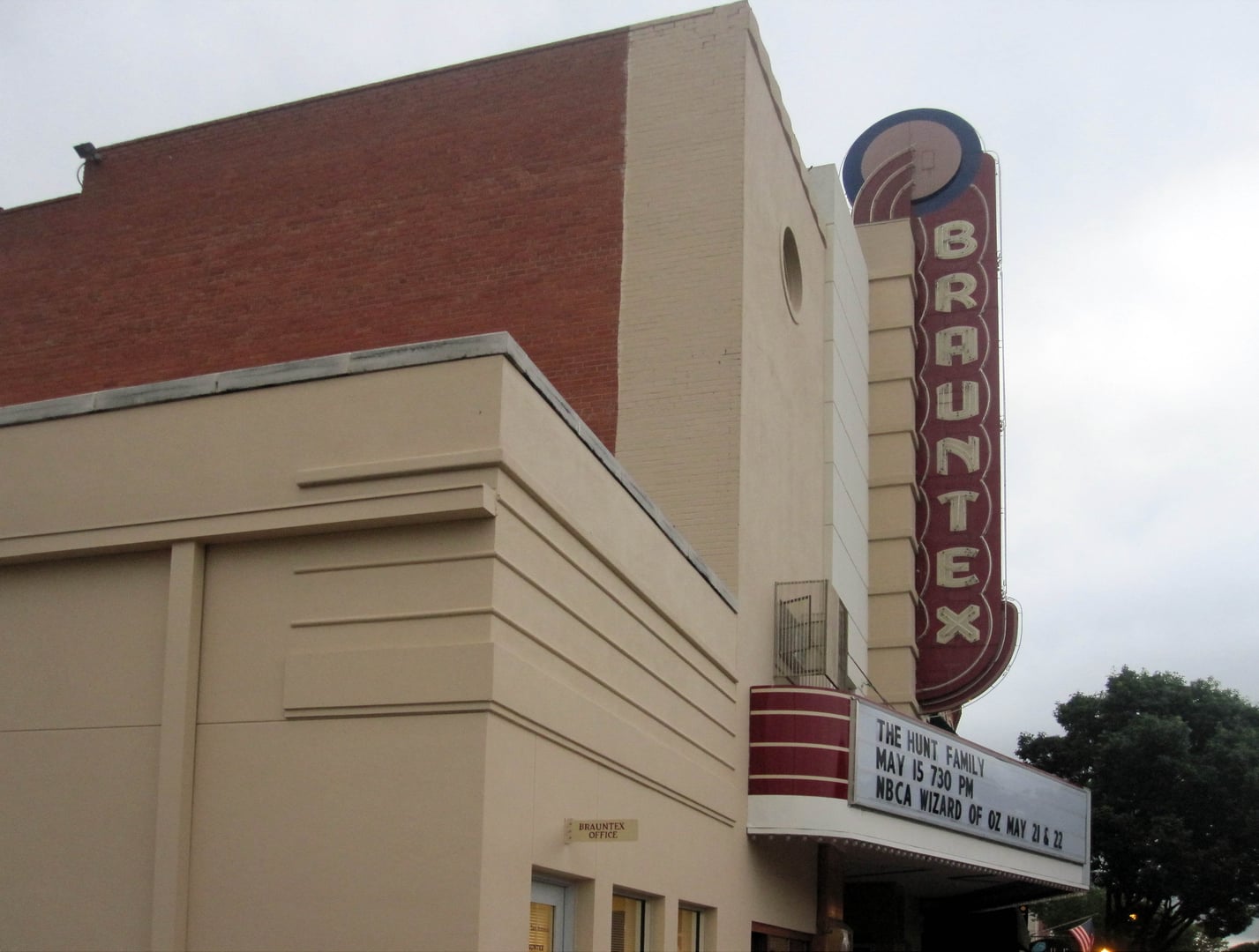 Restored exterior of the Brauntex Theatre in downtown New Braunfels, Texas — a 1942 Moderne-style building on West San Antonio Street