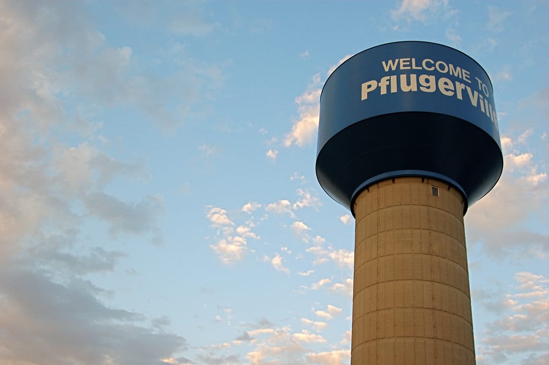 Water tower in a strangely-named city near Austin, Texas.
--
Purchase this image and learn more about it at the source.

Source: &lt;a href="http://photos.jdhancock.com/photo/2009-08-04-002505-welcome-to-pflugerville.html" rel="nofollow"&gt;photos.jdhancock.com/photo/2009-08-04-002505-welcome-to-p..