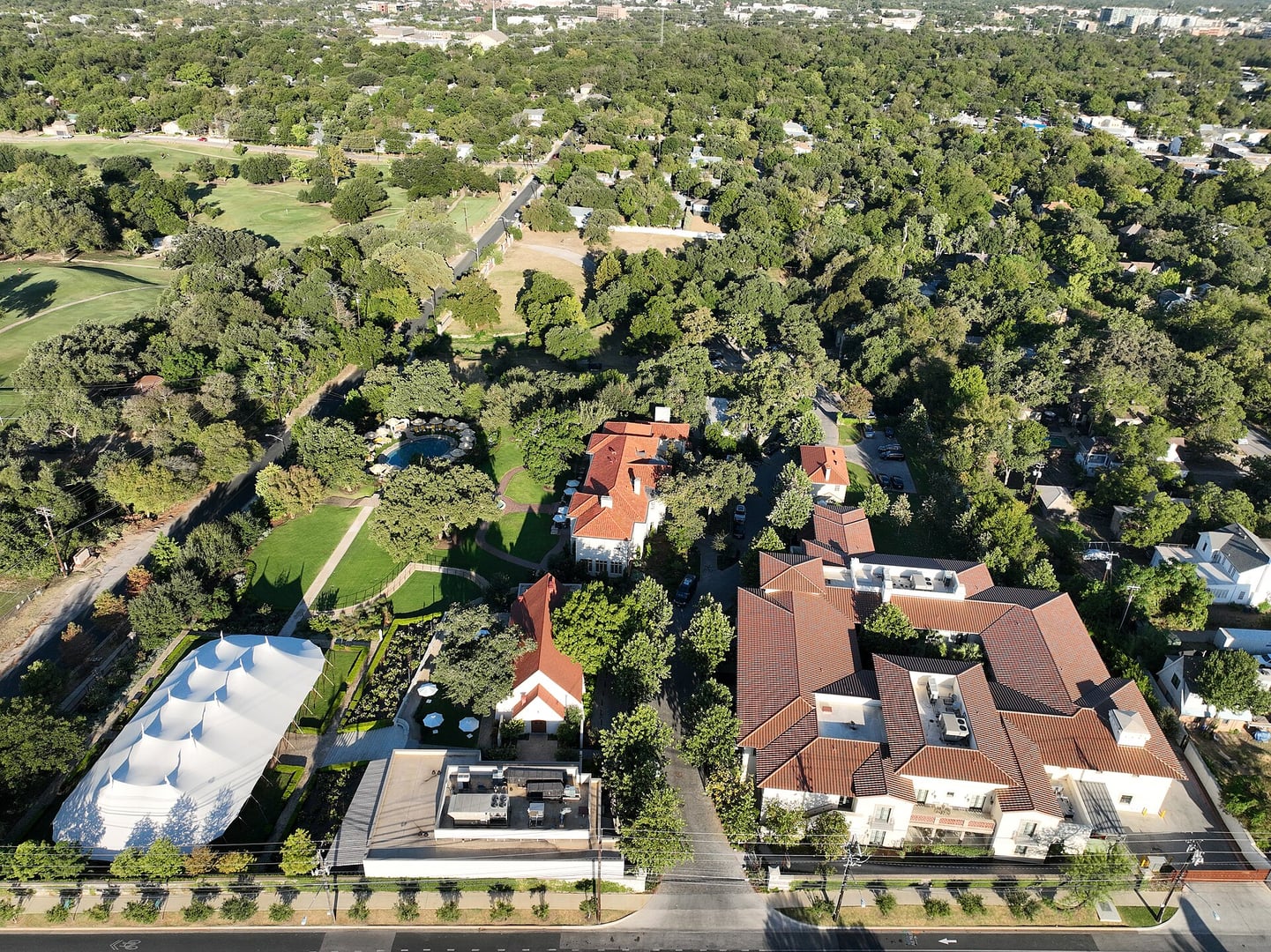 Commodore Perry Estate Hotel Italian Renaissance Revival mansion exterior on Red River Street, Austin, Texas