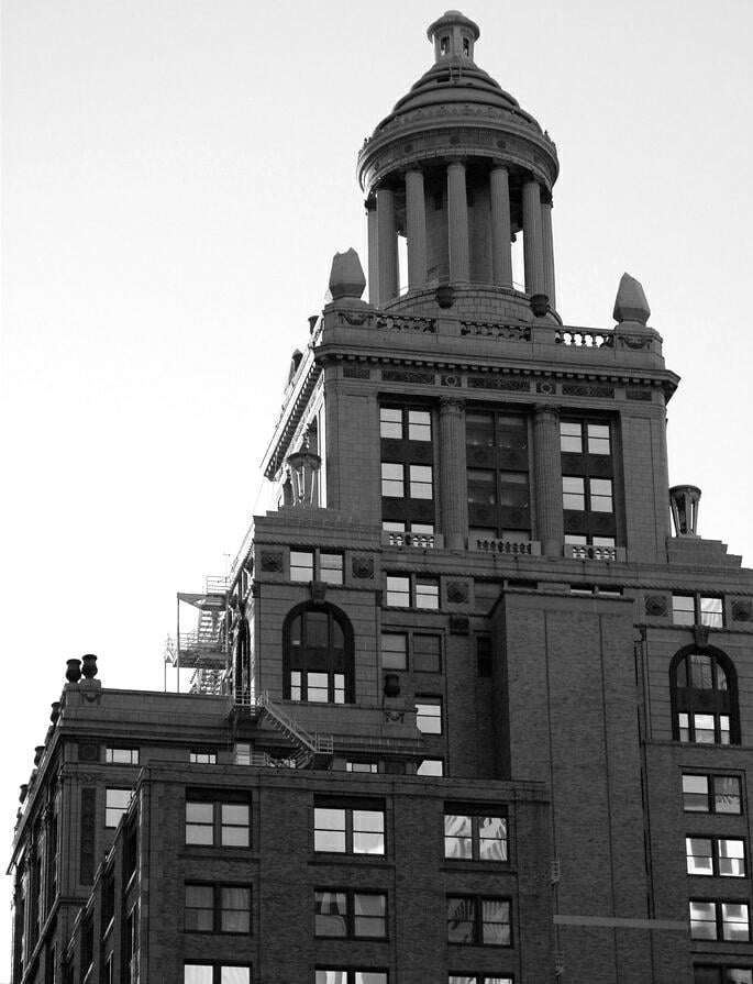 The Italian Renaissance-style Niels Esperson Building with its ornamental tempietto cupola rising over downtown Houston
