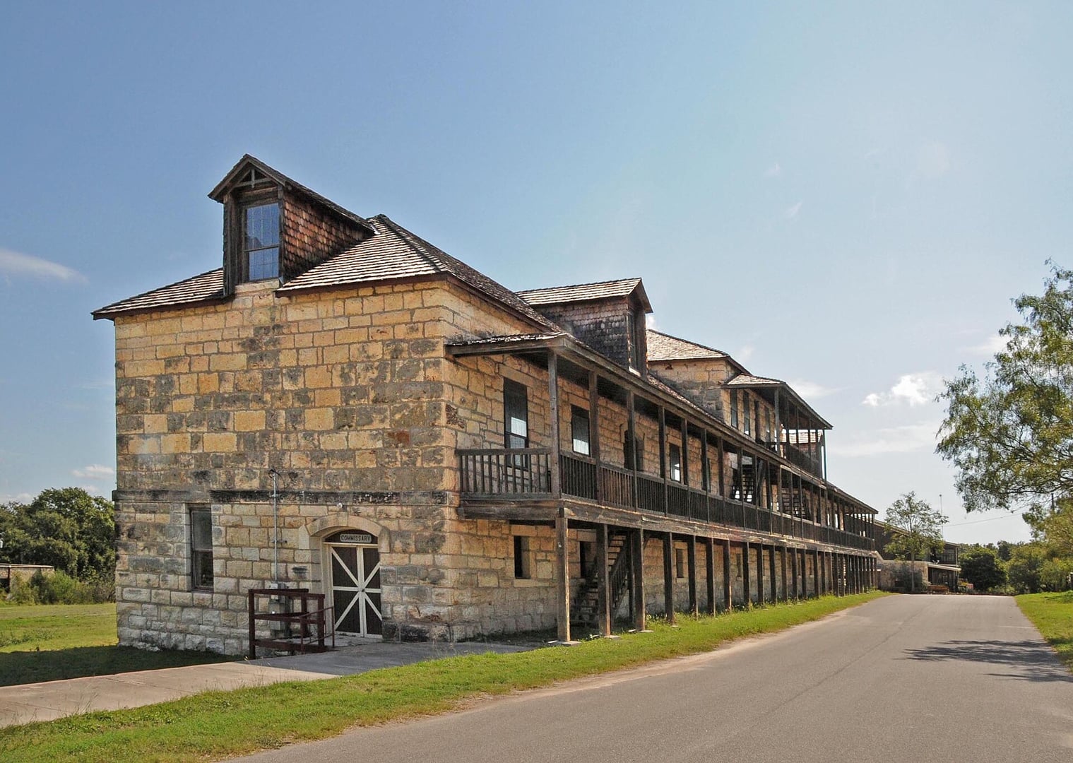 Historic stone commissary building at Fort Clark Springs in Brackettville, Texas — part of the Fort Clark Historic District established 1852
