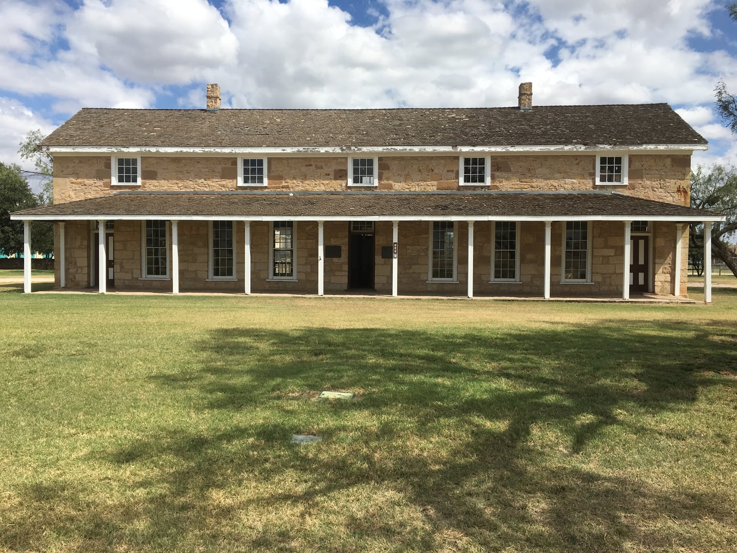 Stone headquarters building and parade ground at Fort Concho National Historic Landmark in San Angelo, Texas