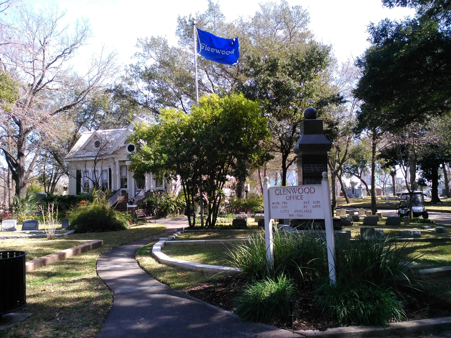 Garden-style monuments and rolling terrain at Glenwood Cemetery in Houston, established 1871
