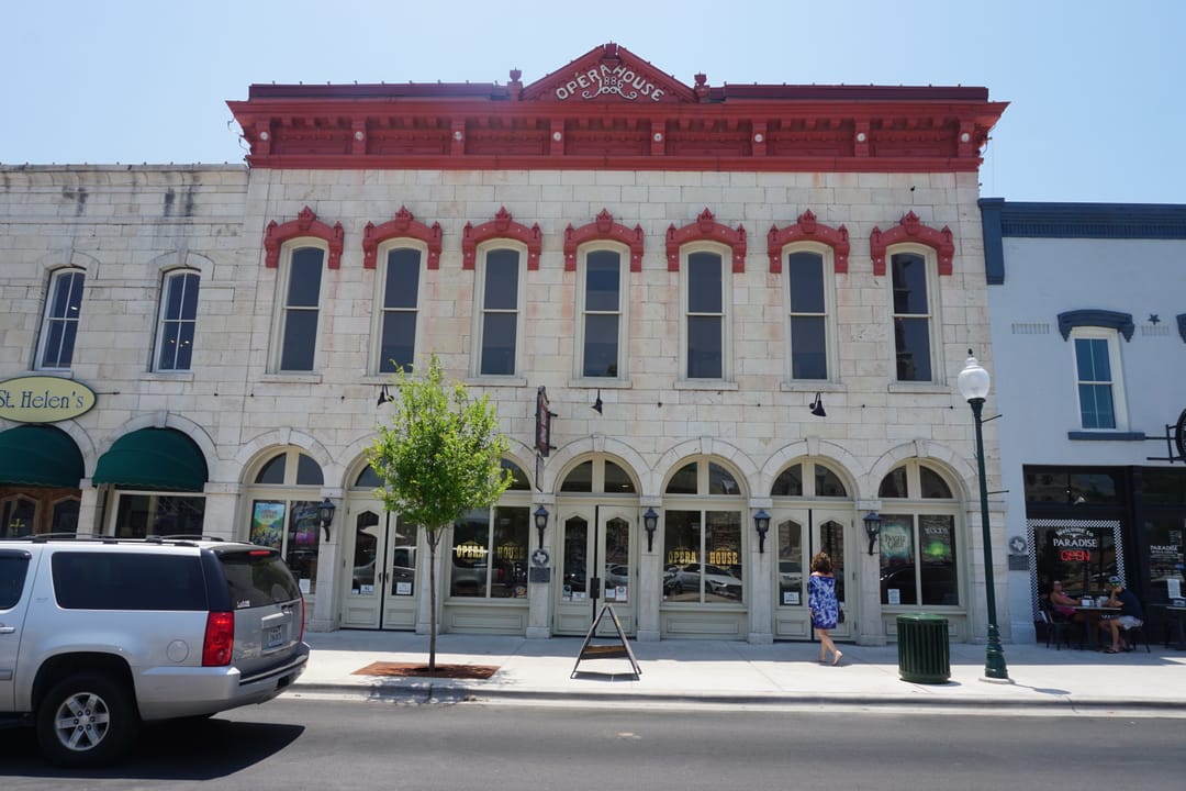 The restored Granbury Opera House on the courthouse square in Granbury, Texas, decorated for the Fourth of July