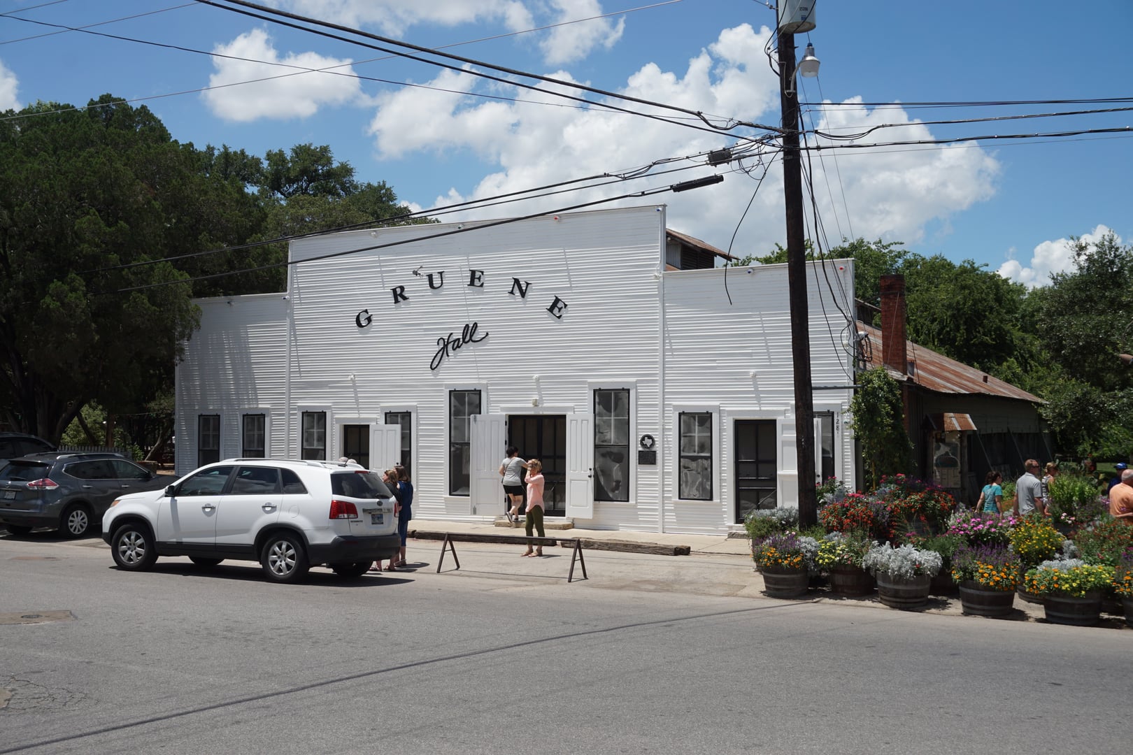 Exterior facade of Gruene Hall in the Gruene Historic District of New Braunfels, Texas, photographed in July 2017