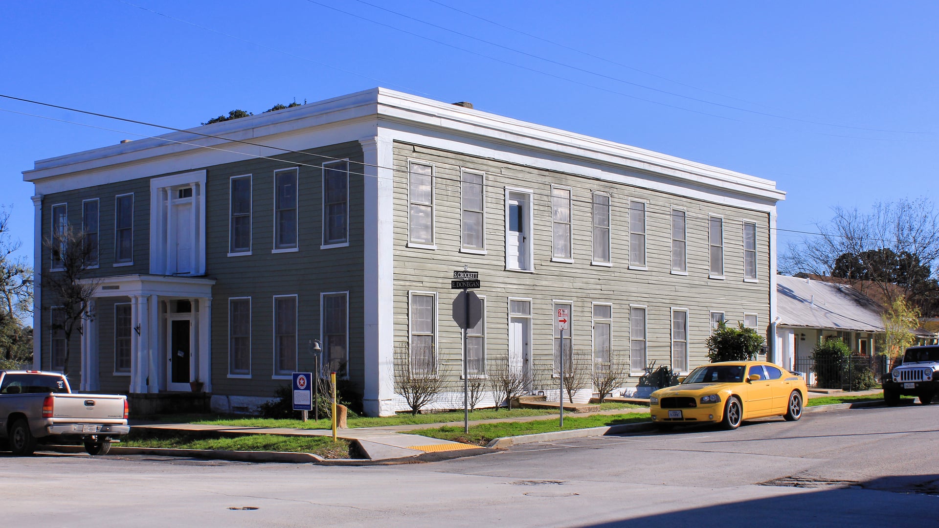 Exterior of the Magnolia Hotel in Seguin, Texas — a two-story 1840s limestone structure on South Crockett Street