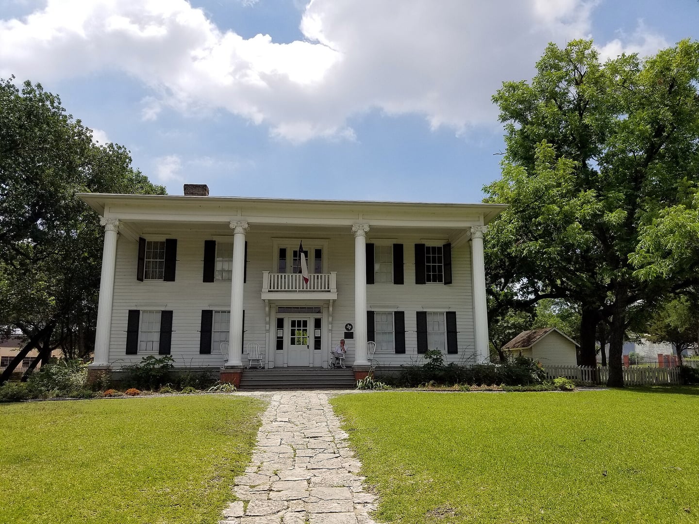 Millermore mansion, an 1861 two-story Greek Revival home at Dallas Heritage Village, Dallas, Texas, with white columned front facade