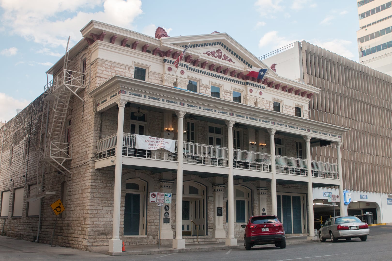 Limestone exterior of the 1878 Millett Opera House at 9th and Brazos, now home of The Austin Club