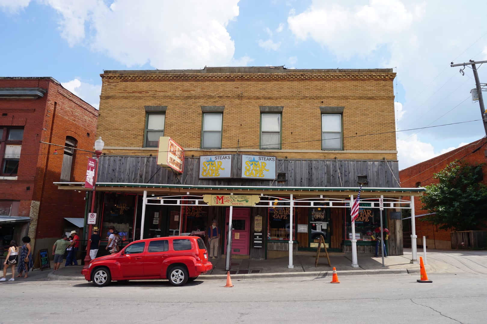 Miss Molly's Hotel upstairs entrance and signage on West Exchange Avenue in the Fort Worth Stockyards
