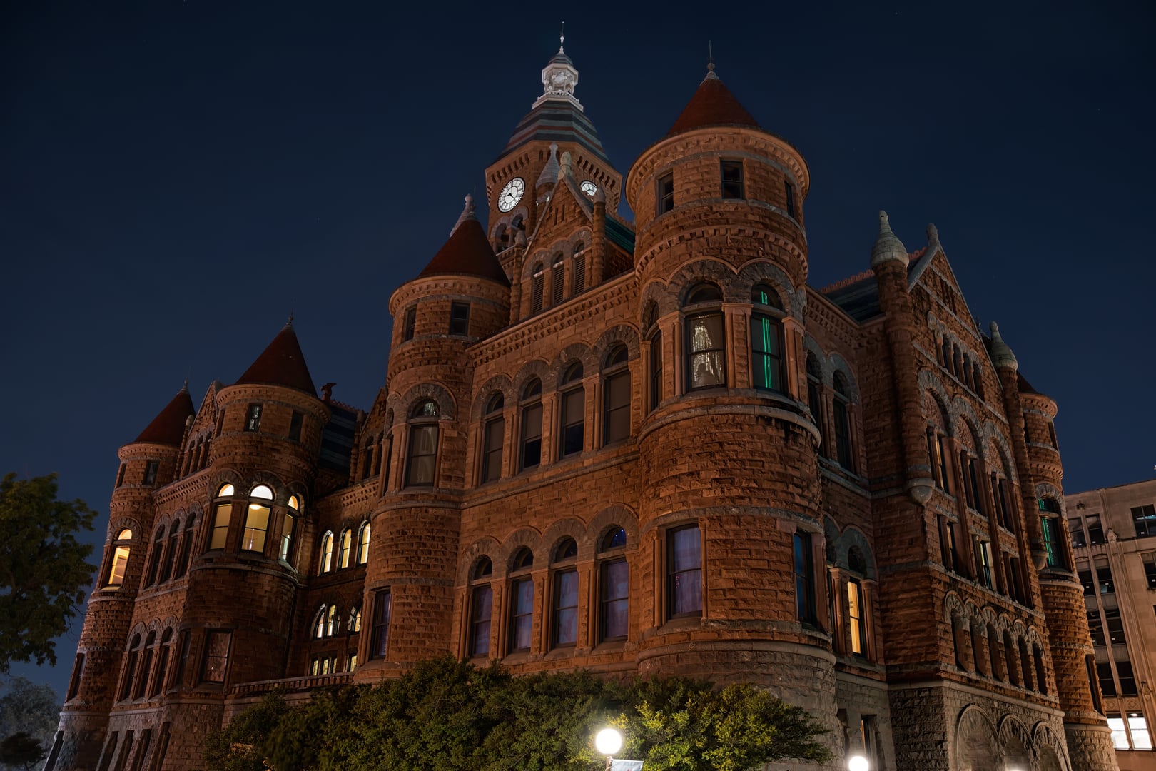 Romanesque Revival red-sandstone facade of the 1892 Old Red Dallas County Courthouse on Founders Plaza in downtown Dallas