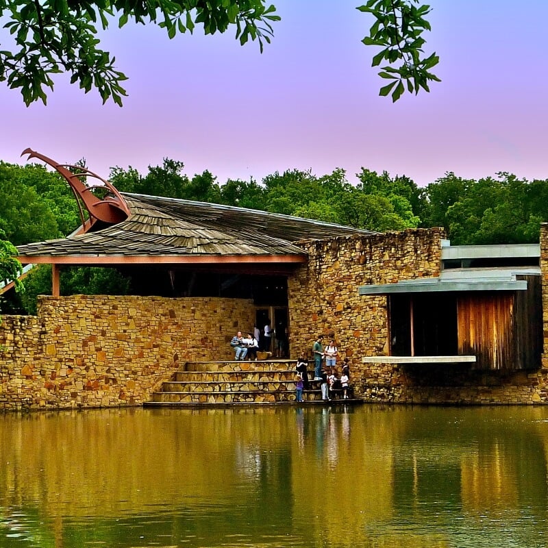 A wooded riverbank trail along the West Fork of the Trinity River in Arlington, Texas