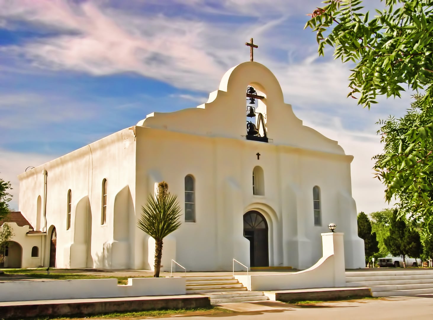 White-plastered adobe facade of the San Elizario Presidio Chapel on the El Camino Real Mission Trail, El Paso County, Texas