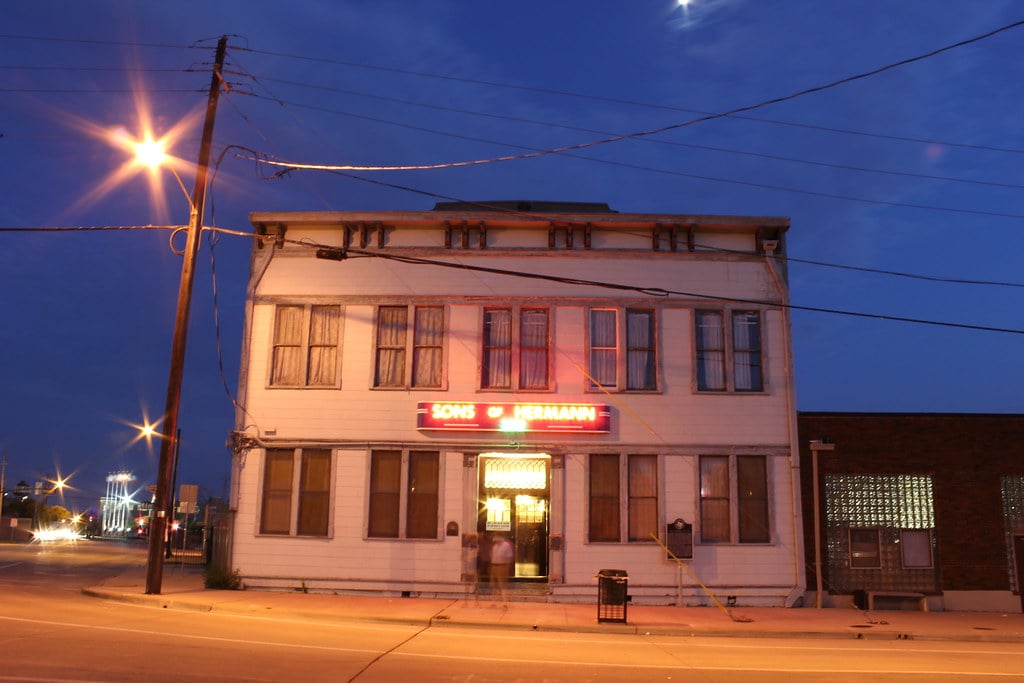 Two-story wood-frame 1911 Sons of Hermann Hall on Elm Street in Dallas's Deep Ellum neighborhood