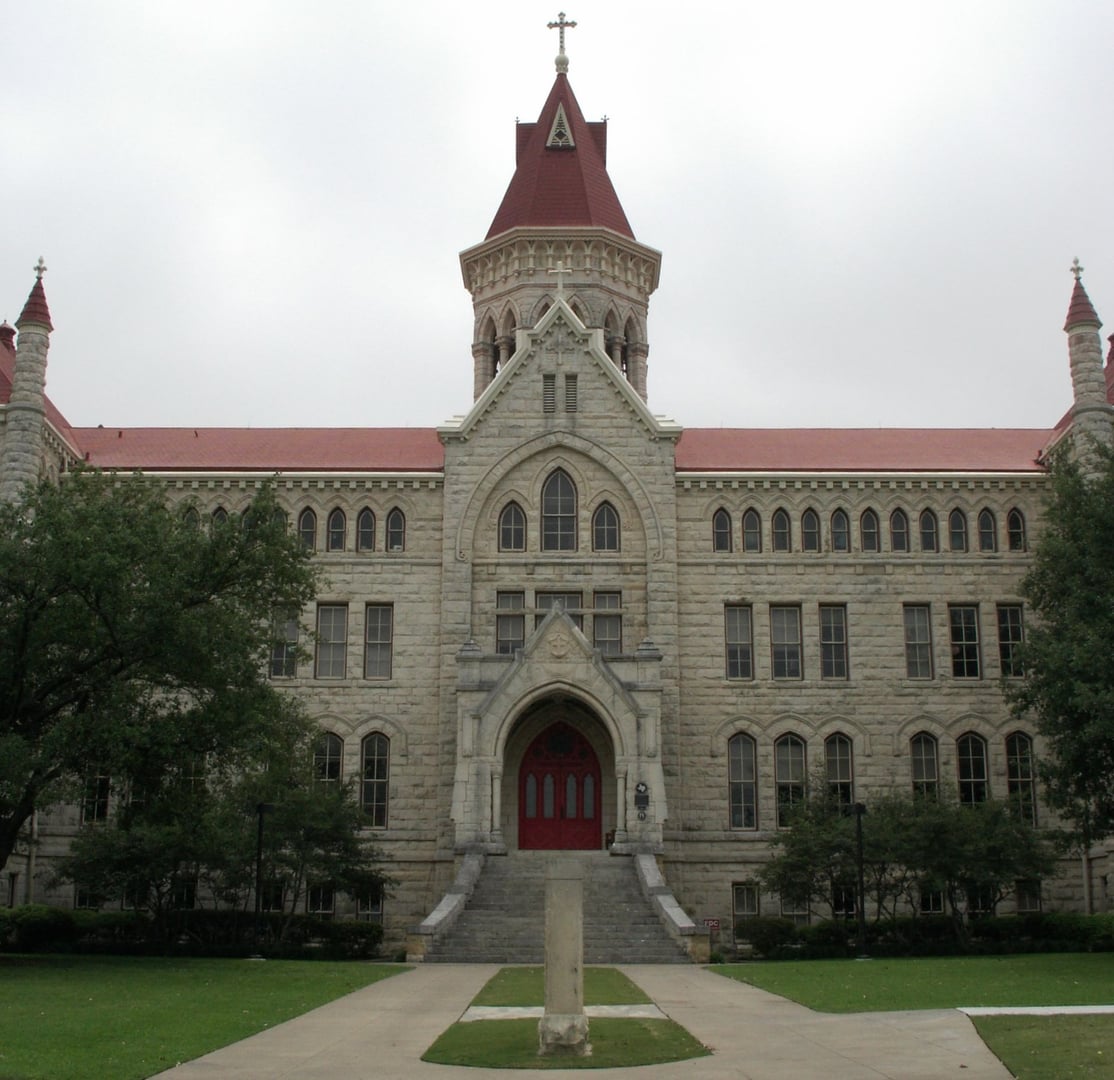 The north side of Main Building at St. Edward's University in Austin — the Gothic Revival limestone structure first completed in 1888 and rebuilt after the 1903 fire