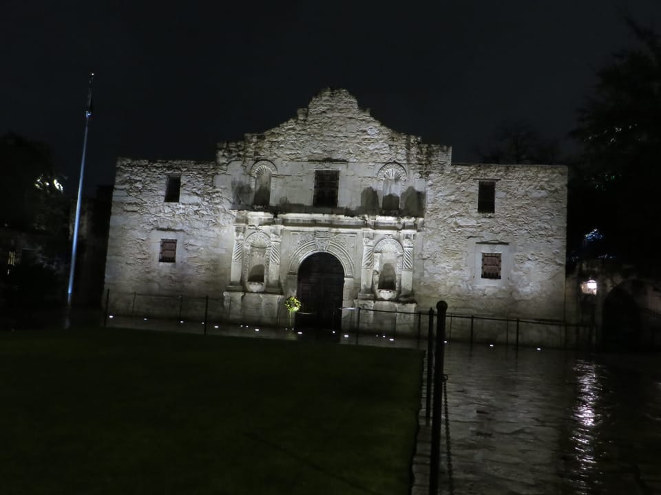 The Alamo church facade illuminated at night, San Antonio, Texas