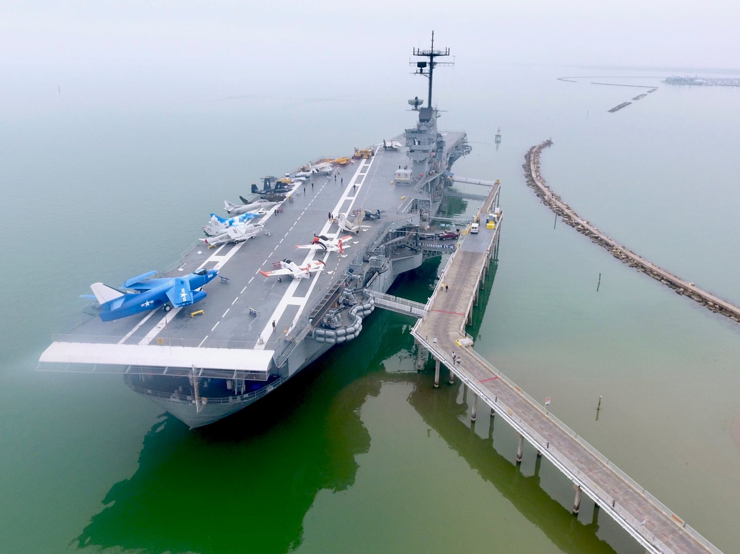 Aerial view of USS Lexington (CV-16) aircraft carrier museum docked along the Corpus Christi, Texas waterfront