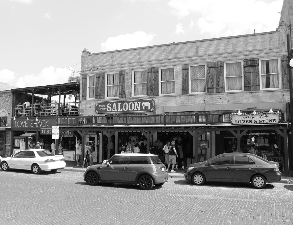 White Elephant Saloon facade with carved wooden white elephant signage on East Exchange Avenue in the Fort Worth Stockyards