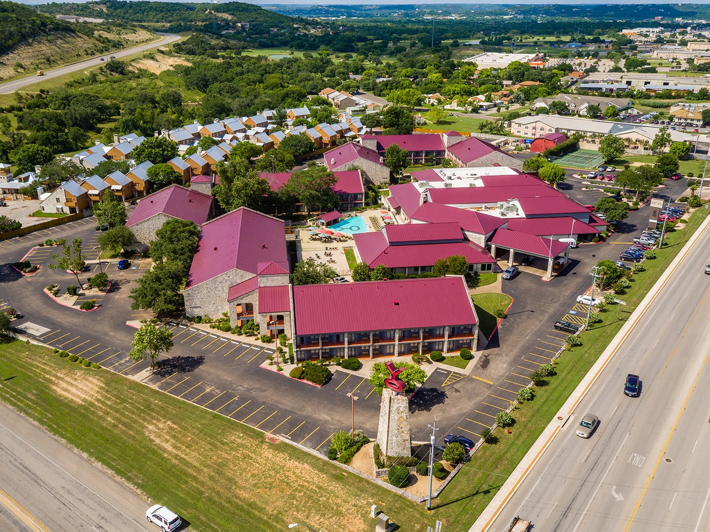 The Y.O. Ranch Hotel exterior in Kerrville, Texas, with western-themed signage