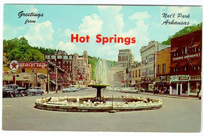 Color photograph of crystal fountain at intersection of Park &amp; Whittington; captioned,
Greetings from Hot Springs Nat'l Park Arkansas"; caption on message side describes fountain &amp; surrounding buildings in the area

Message side very slightly yellowing