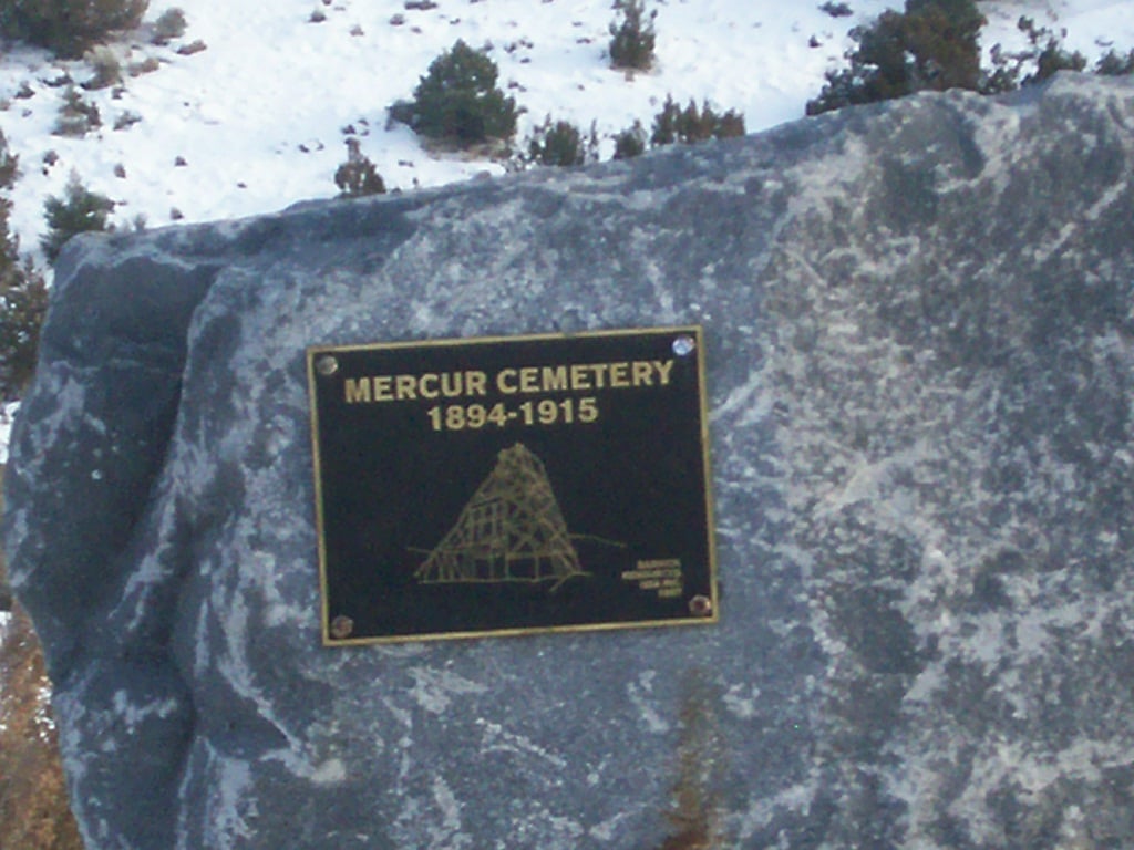 Memorial plaque at the entrance to Mercur Cemetery in Tooele County, Utah, marking the site of the former gold-mining ghost town