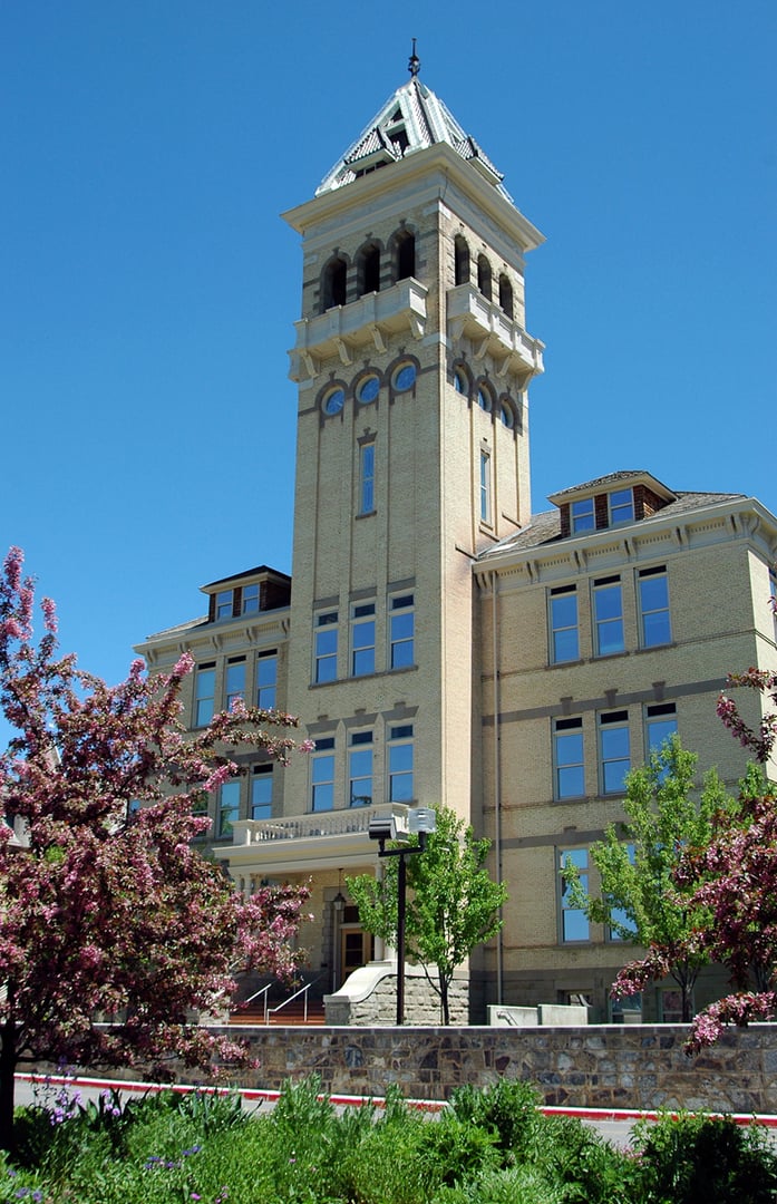 Old Main, the oldest building at Utah State University, with its bell tower atop Old Main Hill in Logan, Utah