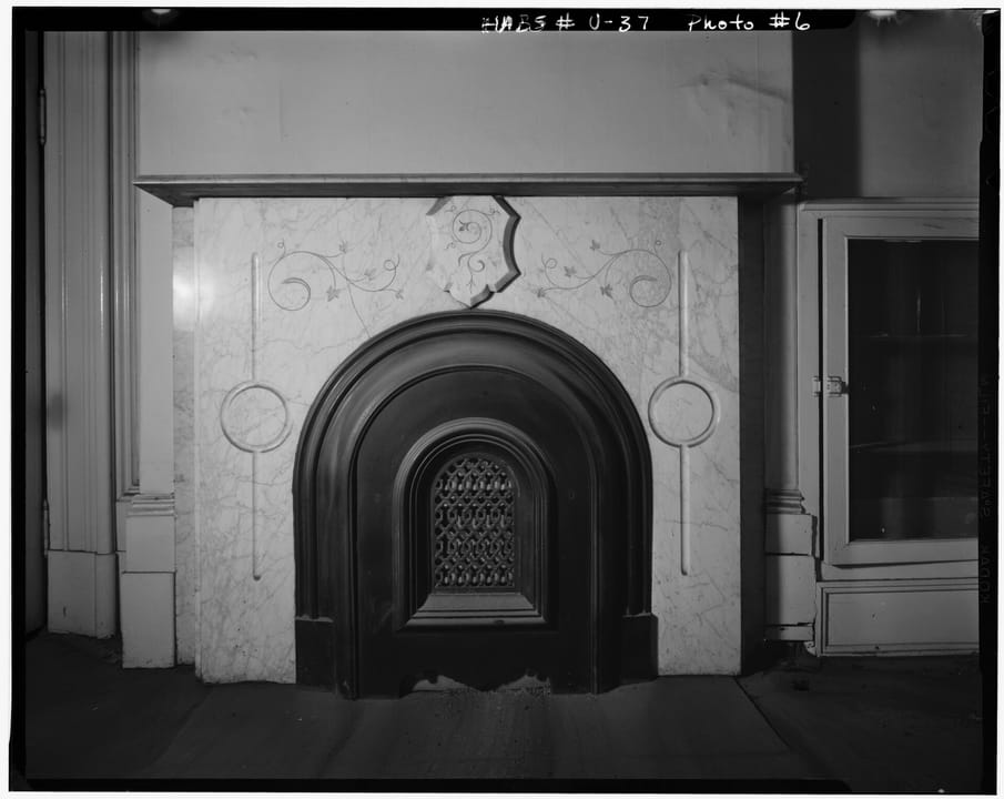 A marble bedroom fireplace surround in the mansion, photographed for the federal historic-building record, 1967.