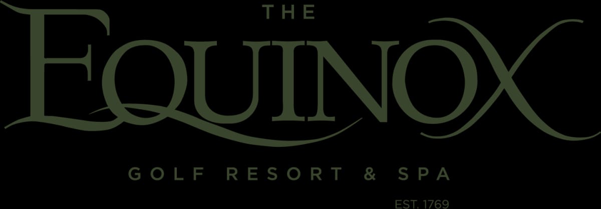 White-columned exterior of The Equinox Hotel in Manchester Village, Vermont