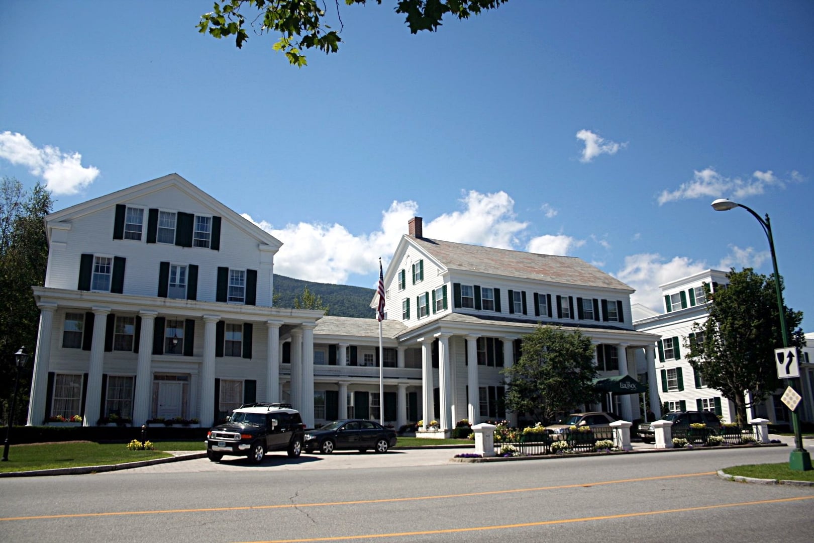 White-columned exterior of The Equinox Hotel in Manchester Village, Vermont