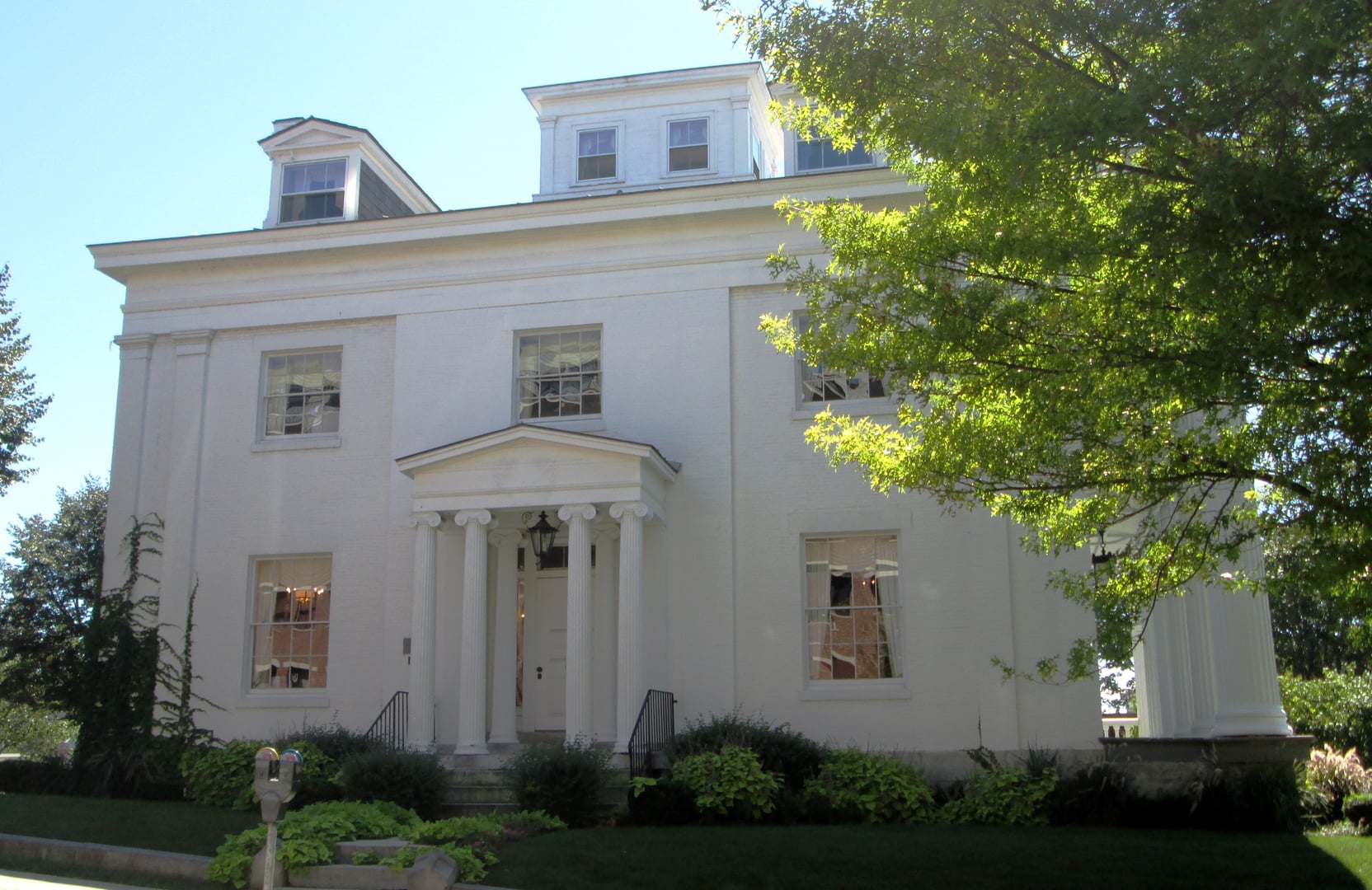 Greek Revival facade of the 1840 Follett House at 63 College Street, Burlington, Vermont