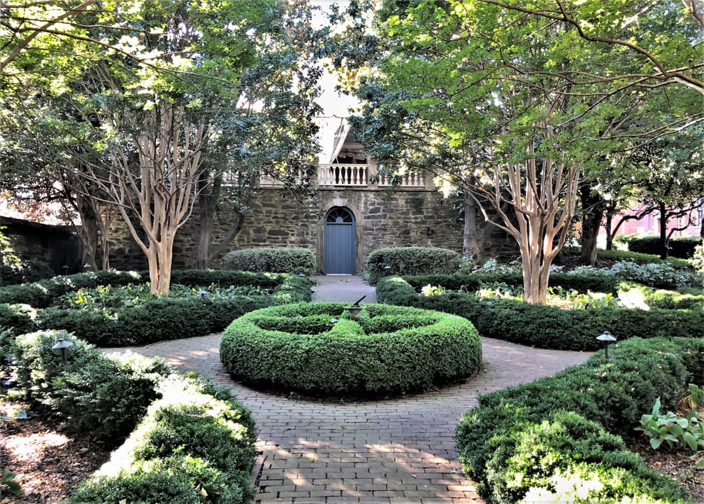 Exterior of the 1753 Carlyle House Georgian sandstone manor at 121 North Fairfax Street in Old Town Alexandria, Virginia