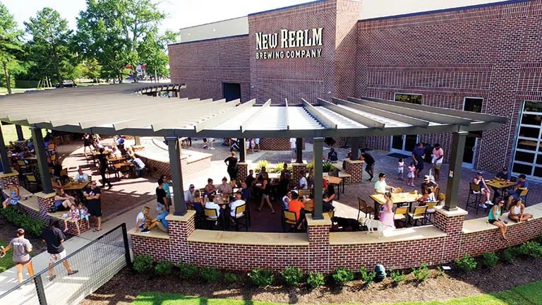 Wide exterior view of New Realm Brewing in the former Chesapeake Beach Volunteer Fire Station, Virginia Beach