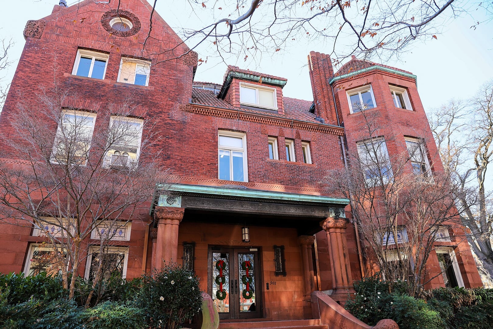 Ginter House exterior at 901 West Franklin Street, Richmond Virginia — a three-and-a-half-story Richardsonian Romanesque mansion with polygonal tower and patterned brick, built 1888-1892 for Lewis Ginter