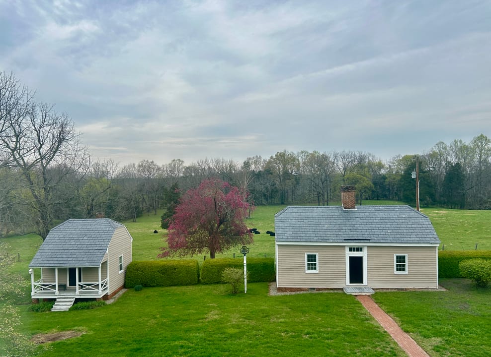 The schoolhouse (L) and kitchen/weaving room (R) in 2024.