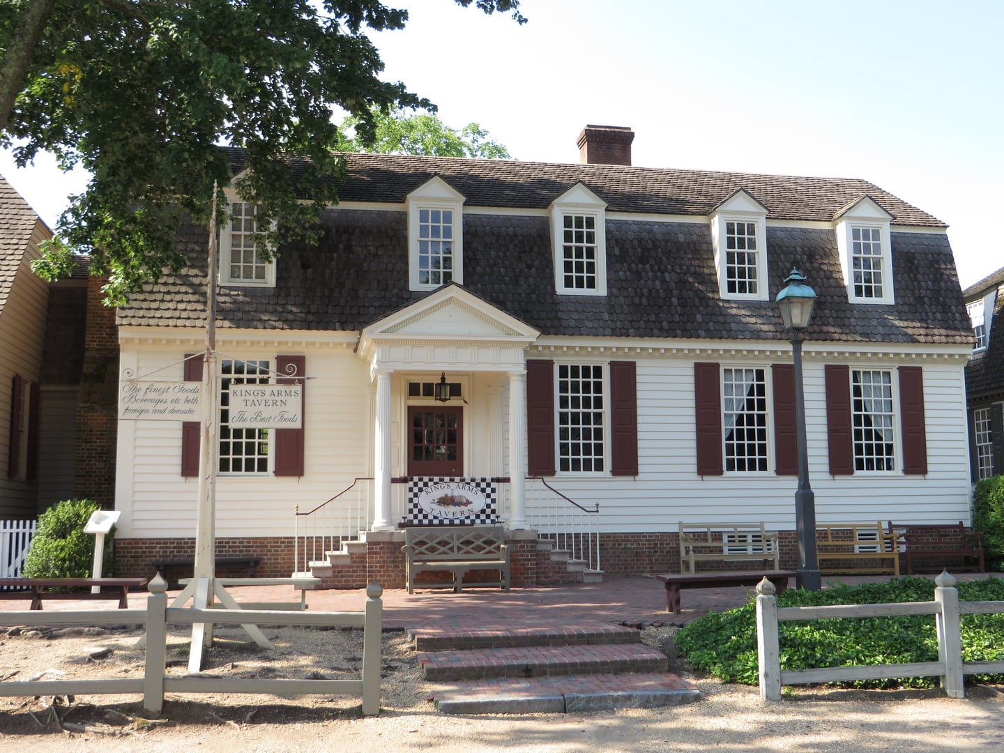 Exterior of King's Arms Tavern on Duke of Gloucester Street in Colonial Williamsburg, Virginia, showing 18th-century brick facade with period signage