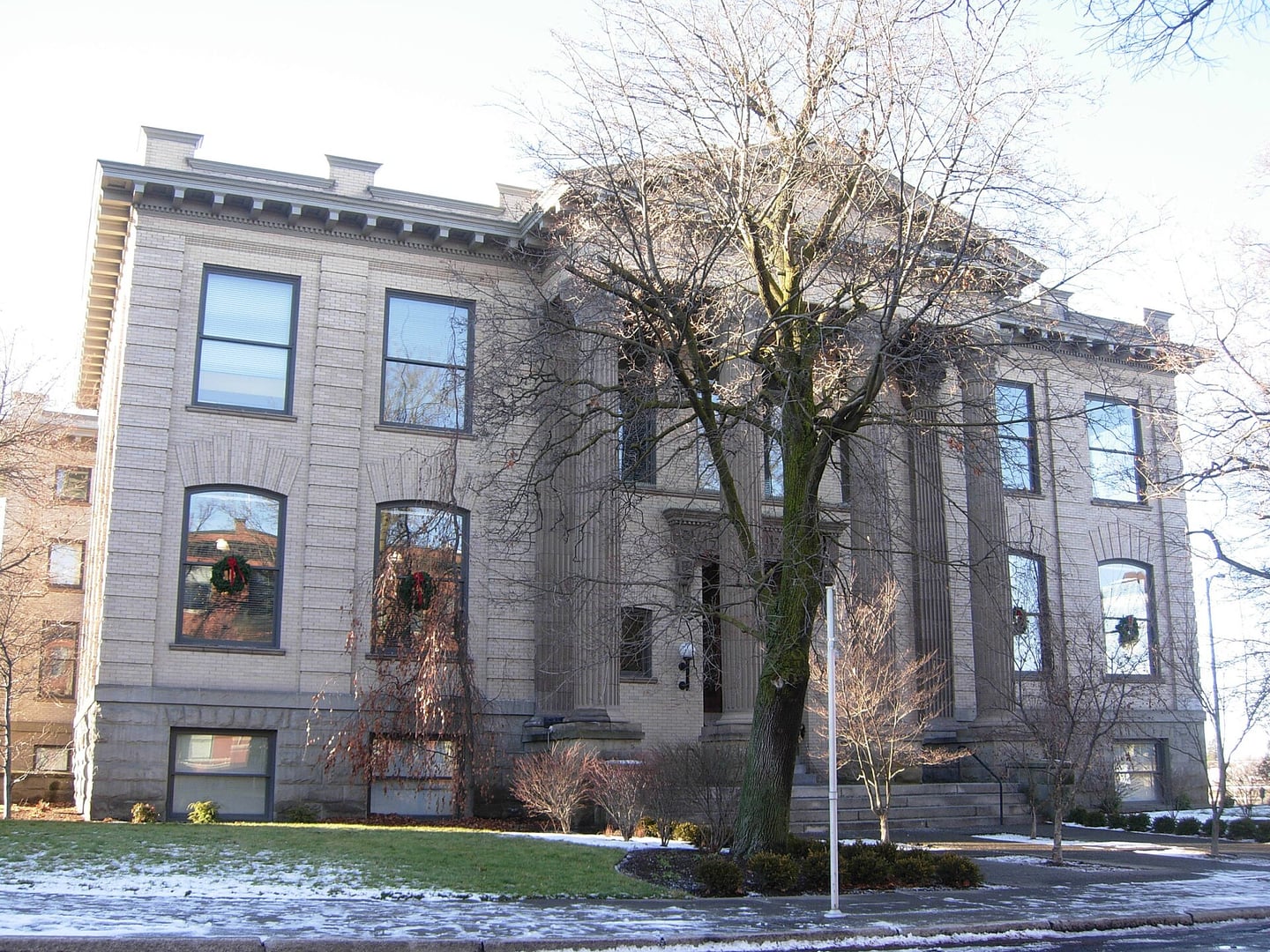 Exterior of the 1905 Carnegie Library building at 10 S Cedar Street in Spokane, Washington, showing the Neo-Classical columned facade