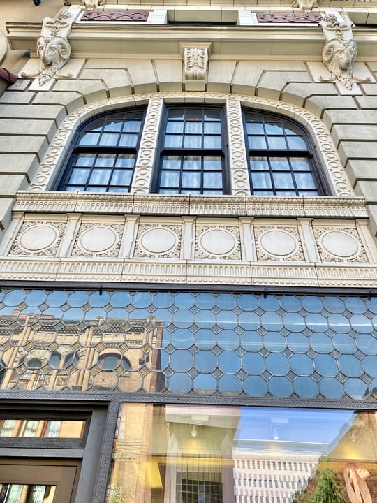 Ornamental terra cotta cornice and leaded-glass transom detail on the Historic Davenport Hotel, Spokane, Washington